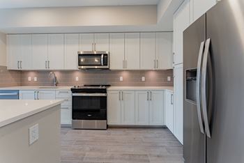 Spacious Kitchen with Appliances	at Mayla Pompano, Pompano Beach, 33062