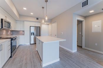 Kitchen with Large Island at Mayla Pompano, Pompano Beach, 33062