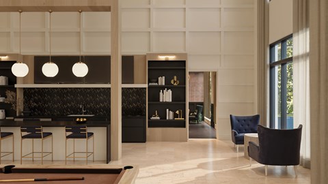 A modern bar area with a pool table and comfortable seating.