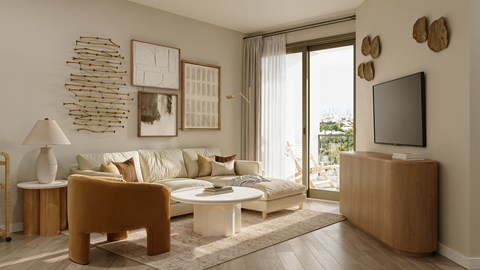 A living room with a white sofa, a brown armchair, a white coffee table, a lamp, a flat screen TV, and a large window with curtains.
