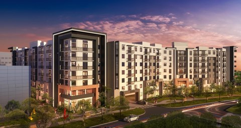 A modern apartment complex with a mix of brick and panel buildings.