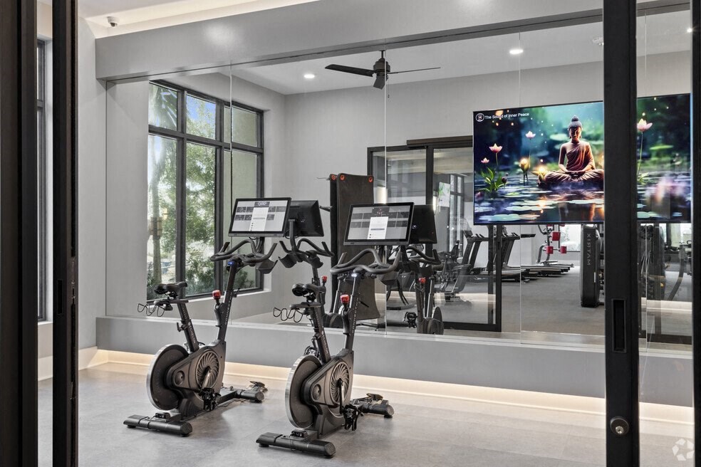 the residence has a gym with treadmills and exercise equipment at Mayla Pompano, Pompano Beach, Florida