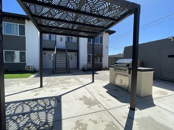 Charle Square patio with a pergola and a BBQ grillth stairs