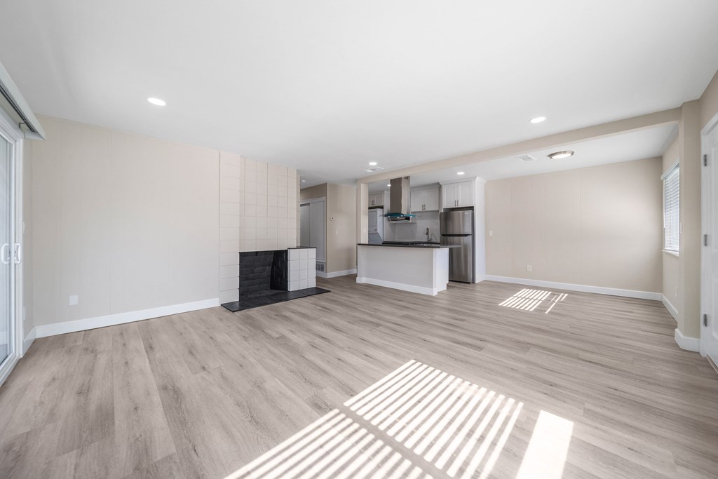 a living room and kitchen a living room and kitchen at Wescove Apartments, West Covina, California