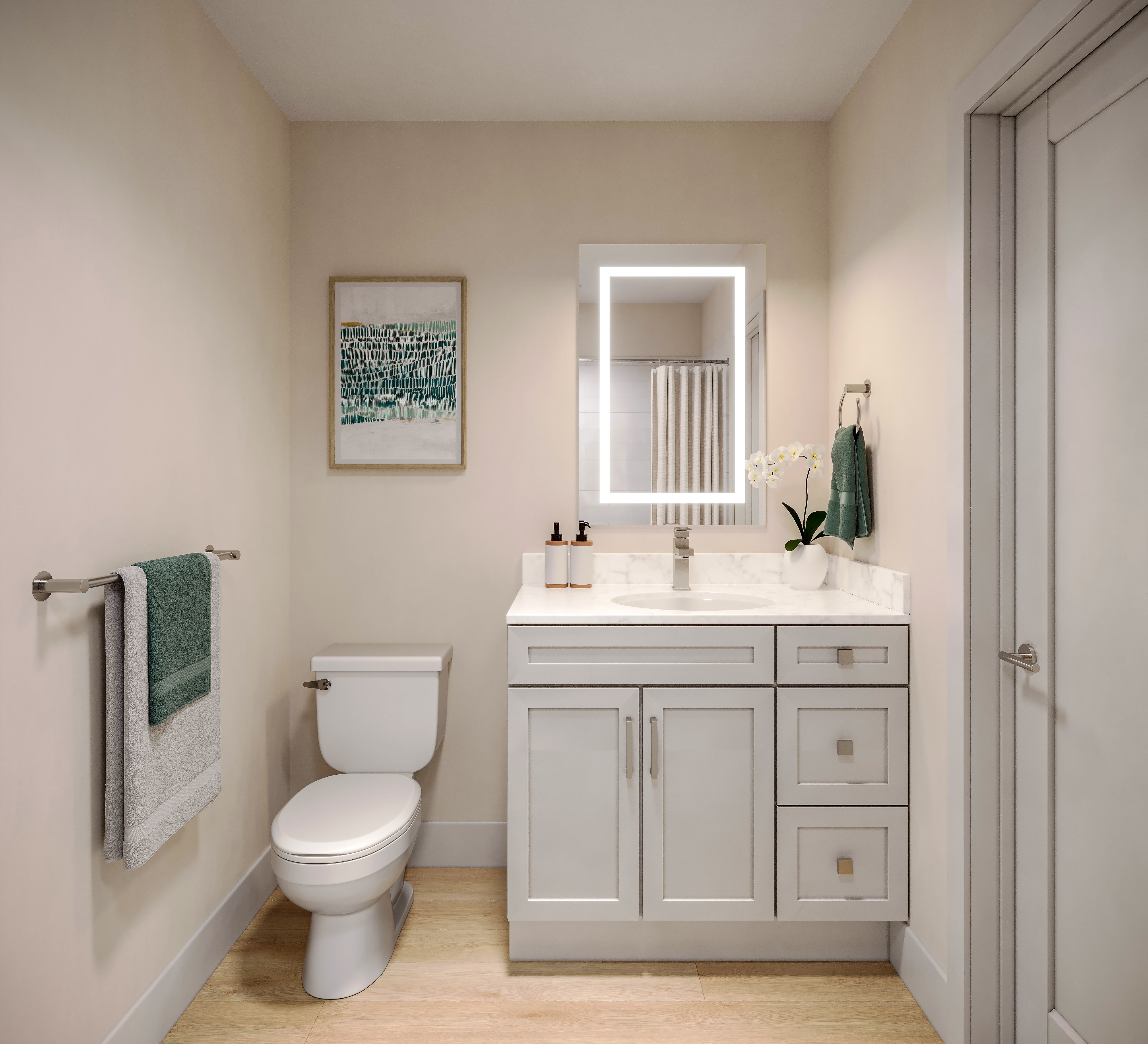 A white toilet sits next to a white sink in a small bathroom.