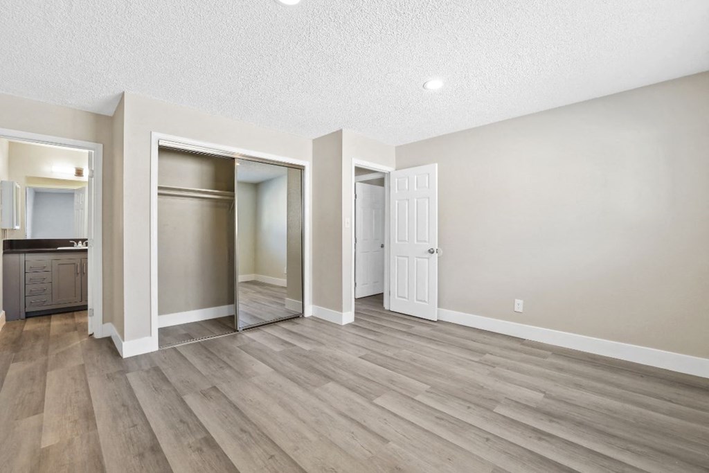 the spacious living room and dining room are open to the kitchen