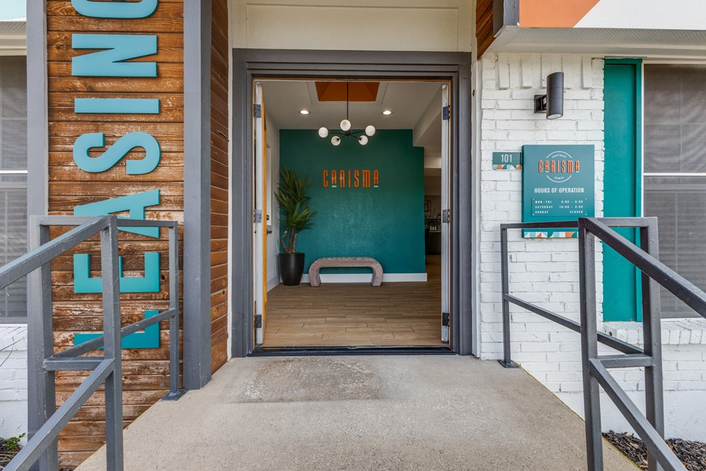 The entrance to a building with a sign that reads "EASING".