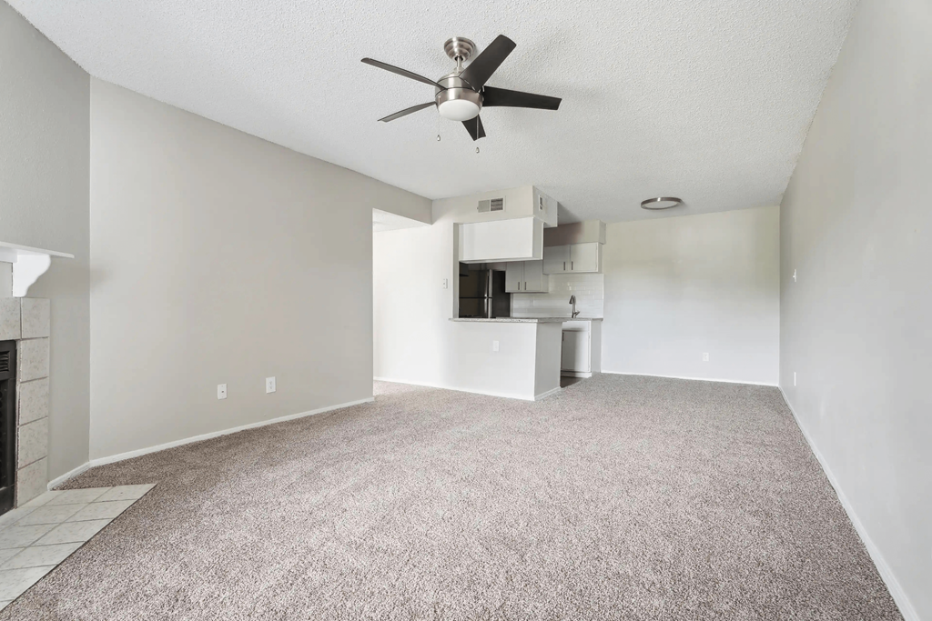 A room with a ceiling fan and a carpeted floor. at Anson at North Hills, Raleigh, NC, 27604