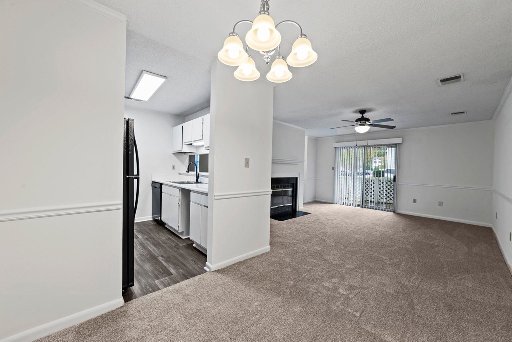 living room with a view of the kitchen at Rosewood at Colony Square, North Carolina, 27804