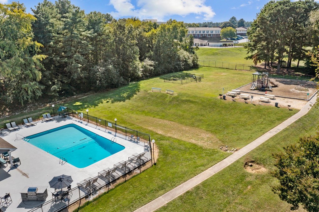 pool with nature surrounding it at Rosen at North Hills, Raleigh