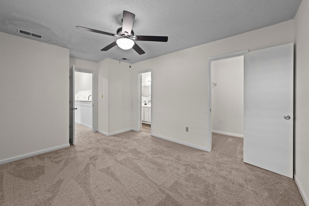 living room with carpet at Rosewood at Colony Square, Rocky Mount, NC