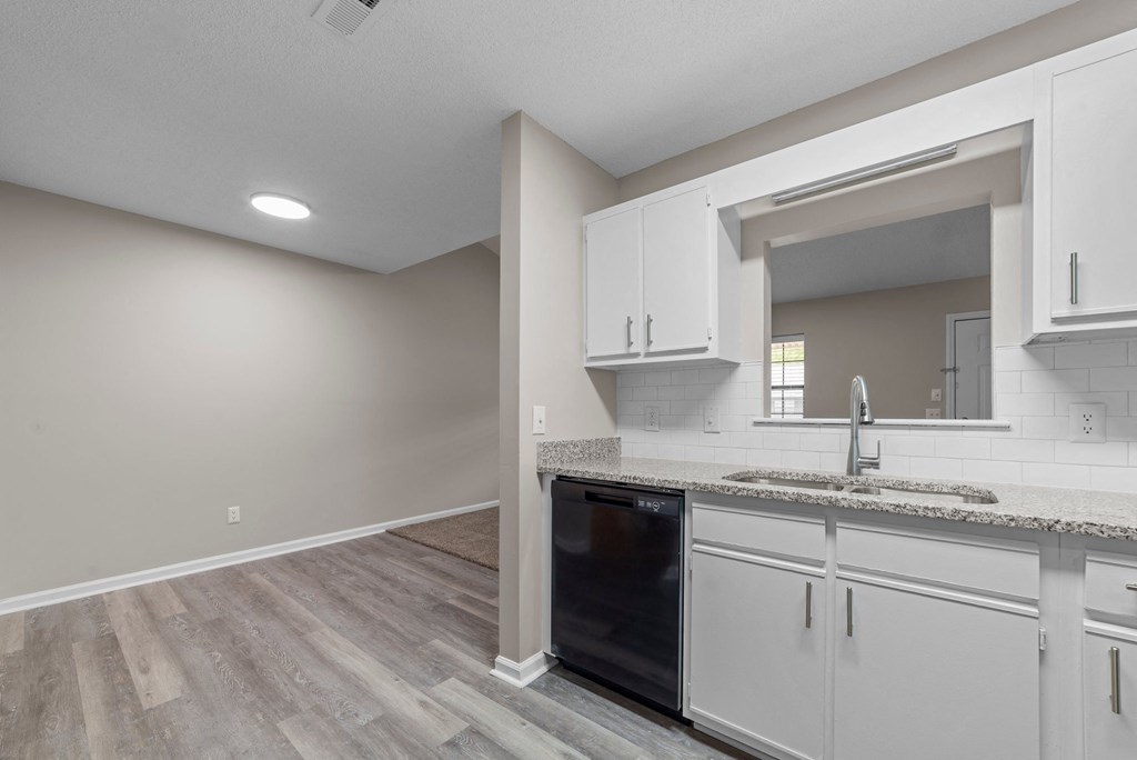 kitchen with faux wood flooring at Bennett, Greenville, NC, 27858