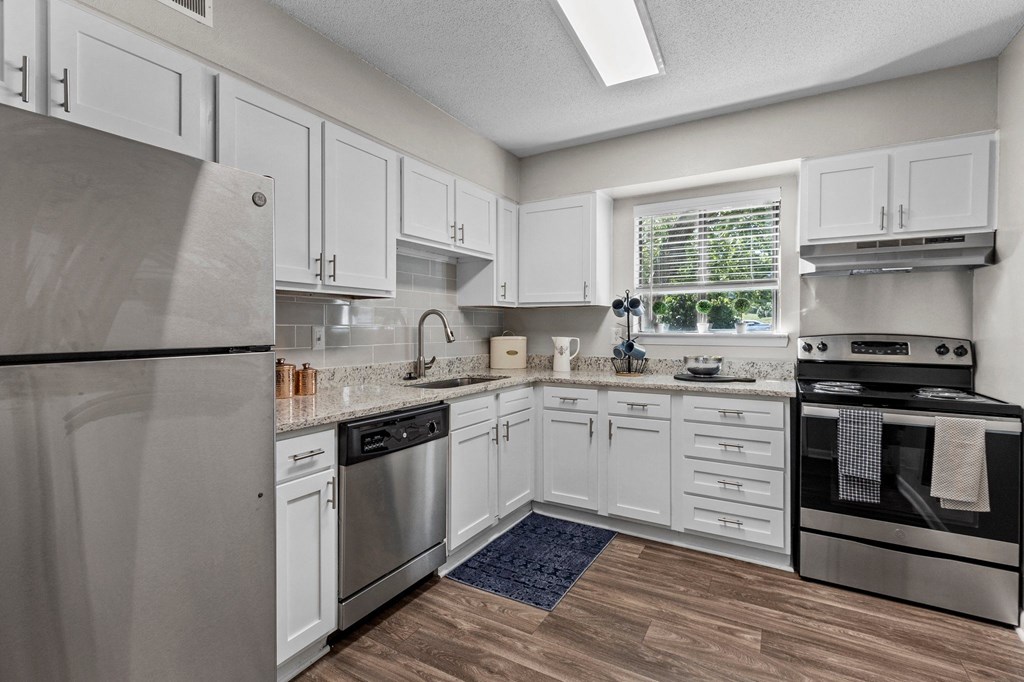 kitchen with stainless steel appliances at Rosen at North Hills, Raleigh