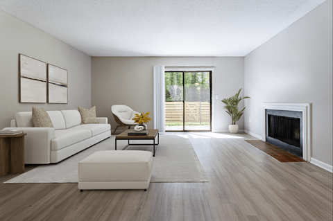 Living Area With Fireplace at Rosen at North Hills, Raleigh, North Carolina