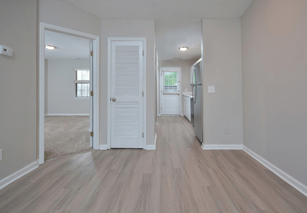 apartment living room to kitchen at Bennett, Greenville, North Carolina