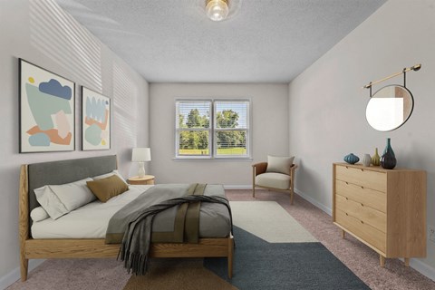 a bedroom with a bed and a dresser and a window