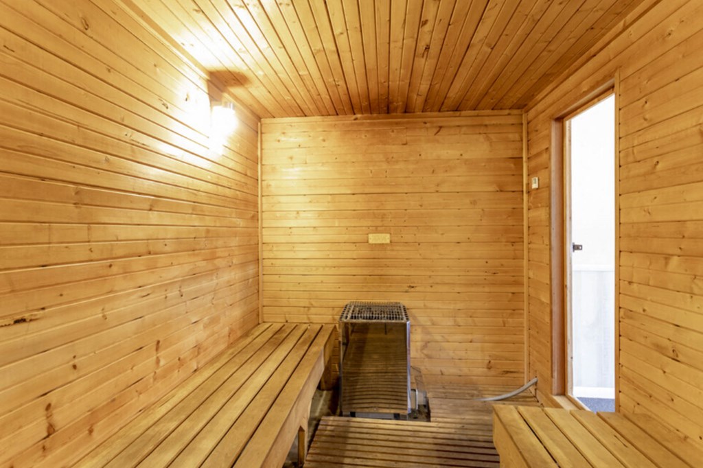 the sauna is equipped with a bench and a window  at Henley, North Carolina, 28311