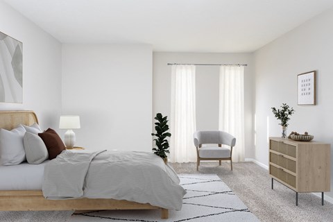 a bedroom with a bed and a chair and a dresser