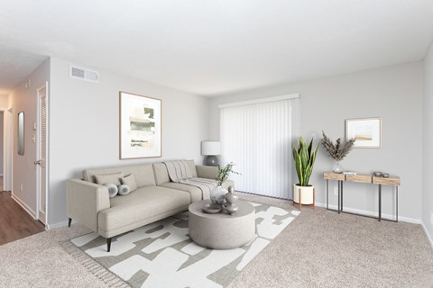 a living room with a couch and a coffee table