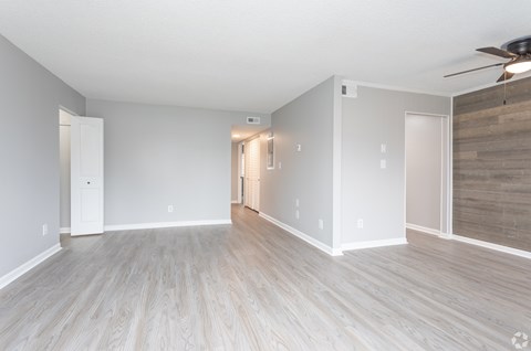 A spacious room with light wood flooring at Liberty Crossing, North Carolina, 28540
