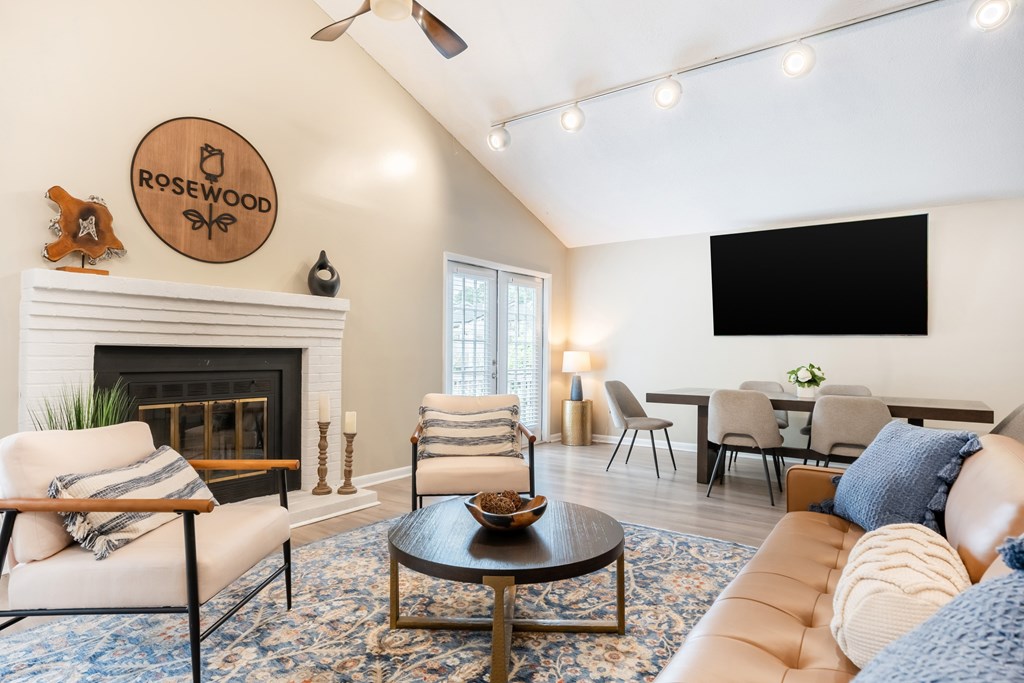Lounge With TV and Fireplace at Rosewood at Colony Square, Rocky Mount, NC