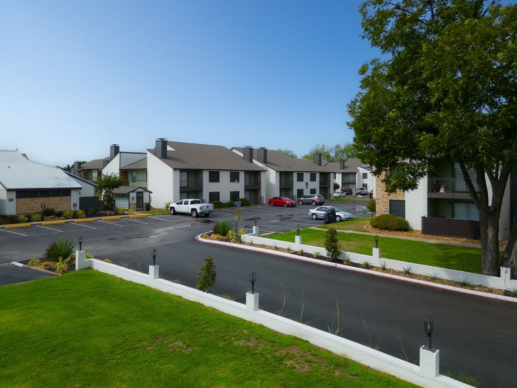 a view of a street in a neighborhood with houses