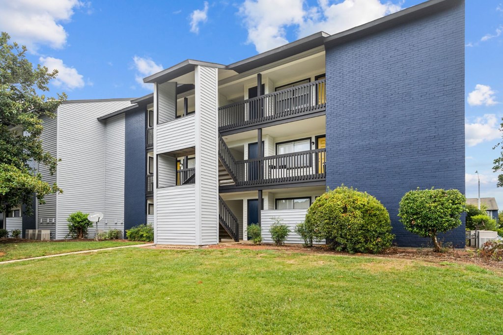 anson at north hills blue and white apartment building