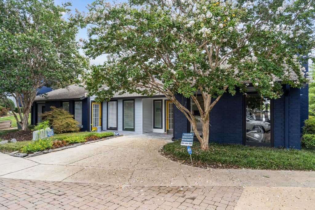 anson at north hills blue and white apartment building leasing office