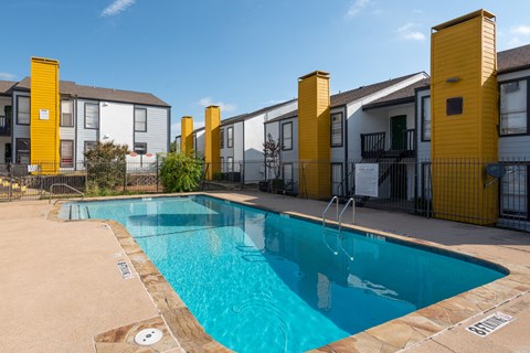 our apartments have a large swimming pool in front of our buildings at Helios, Dallas, 75240