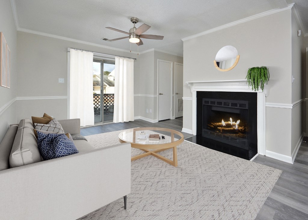 a living room with a fireplace and a couch