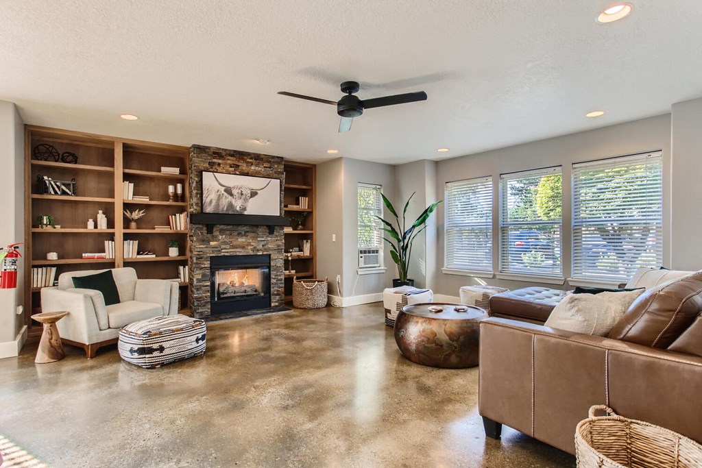 a living room with a couch and a fireplace