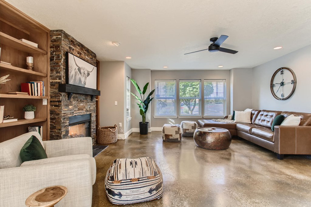 a living room with couches and a fireplace