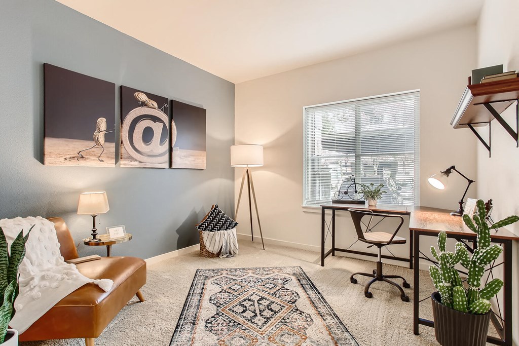 Fairview, OR Apartments-Lodges at Lake Salish-Bedroom with Large Window and Carpet Flooring