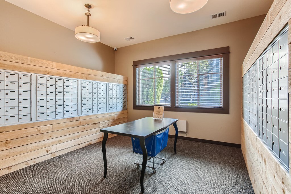 a locker room with a table and a chair