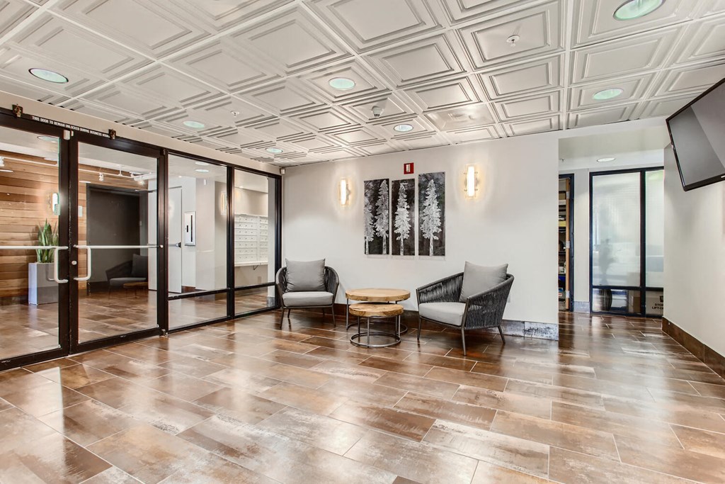 the preserve at cardinal courts lobby with chairs and a table