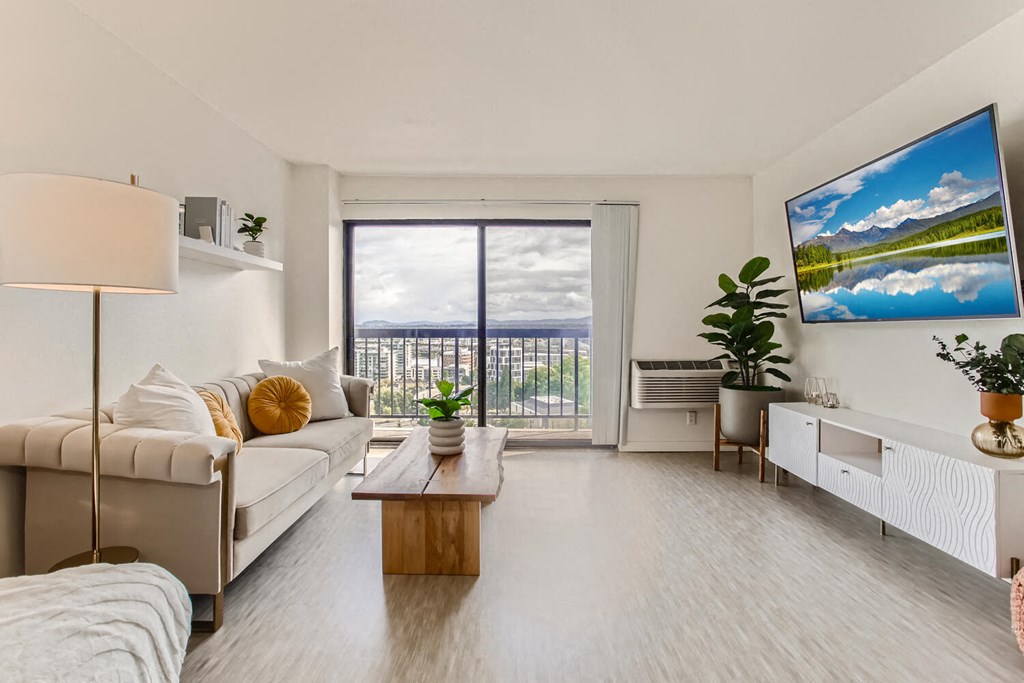 a living room with a couch and a table