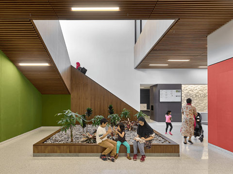 the building functions as a hub for community interaction and breakout space for students and staff