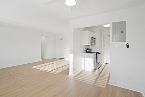 Kitchen, living and dining room  with vinyl plank flooring.