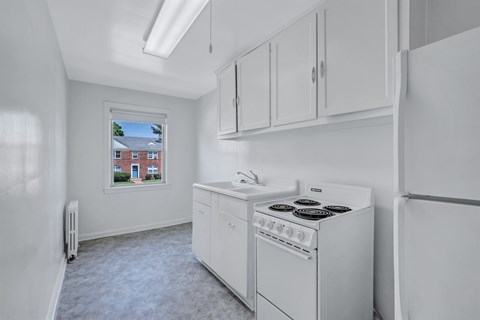 Kitchen with white cabinets