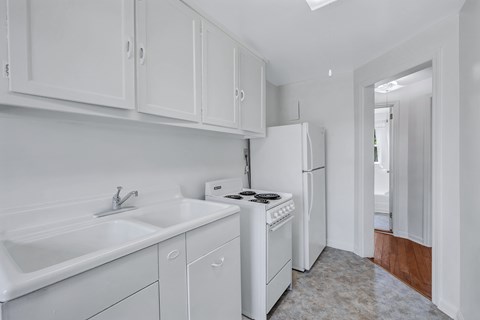 Kitchen with white cabinets