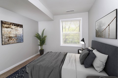grey bed in room