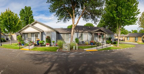 a house with a driveway and a street in front of it