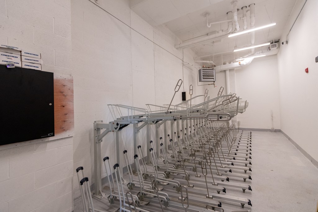 a long row of chairs in a room