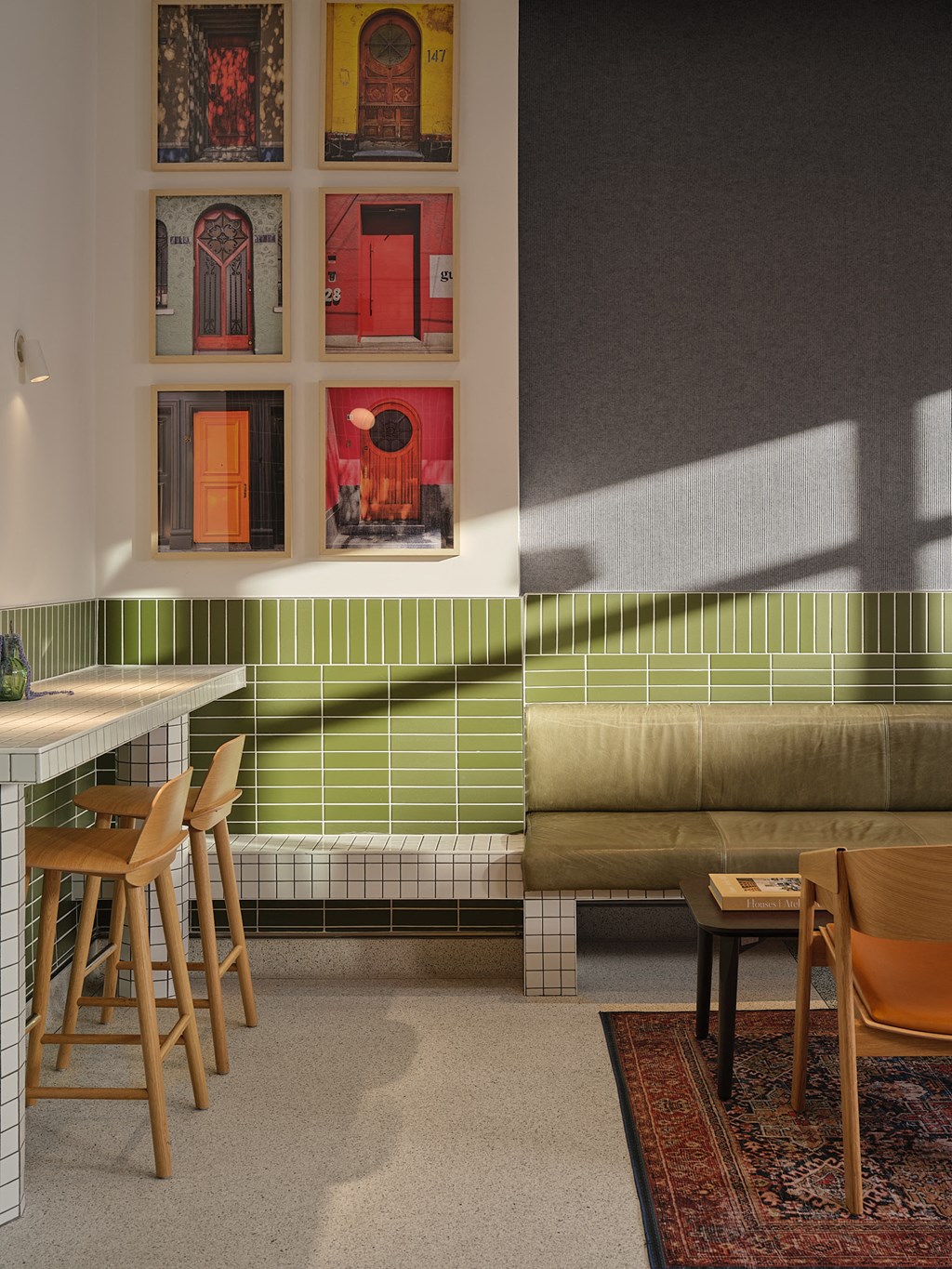 a living room with a table and chairs and a couch