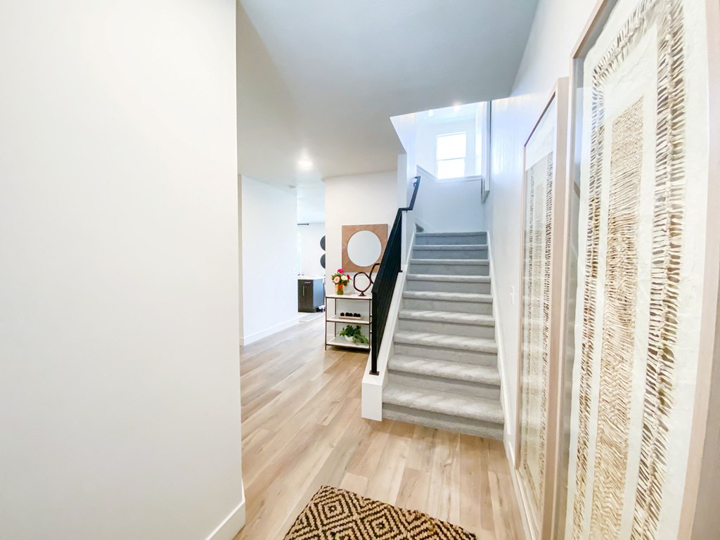 open and bright entryway leading up to second floor