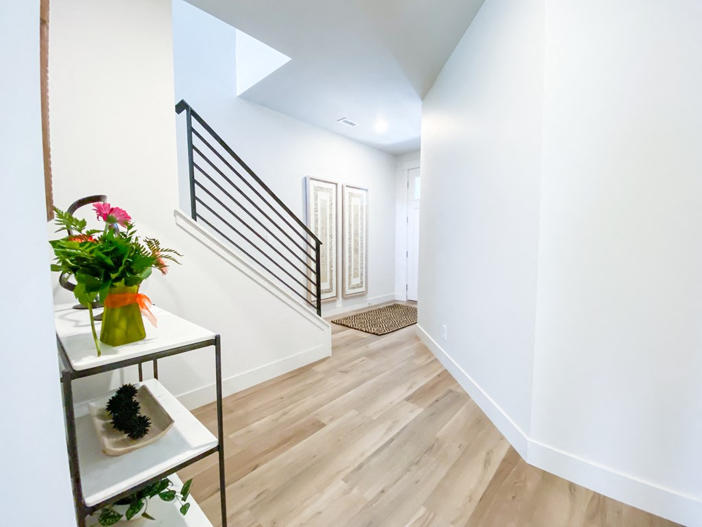 private entry way with modern black iron railings