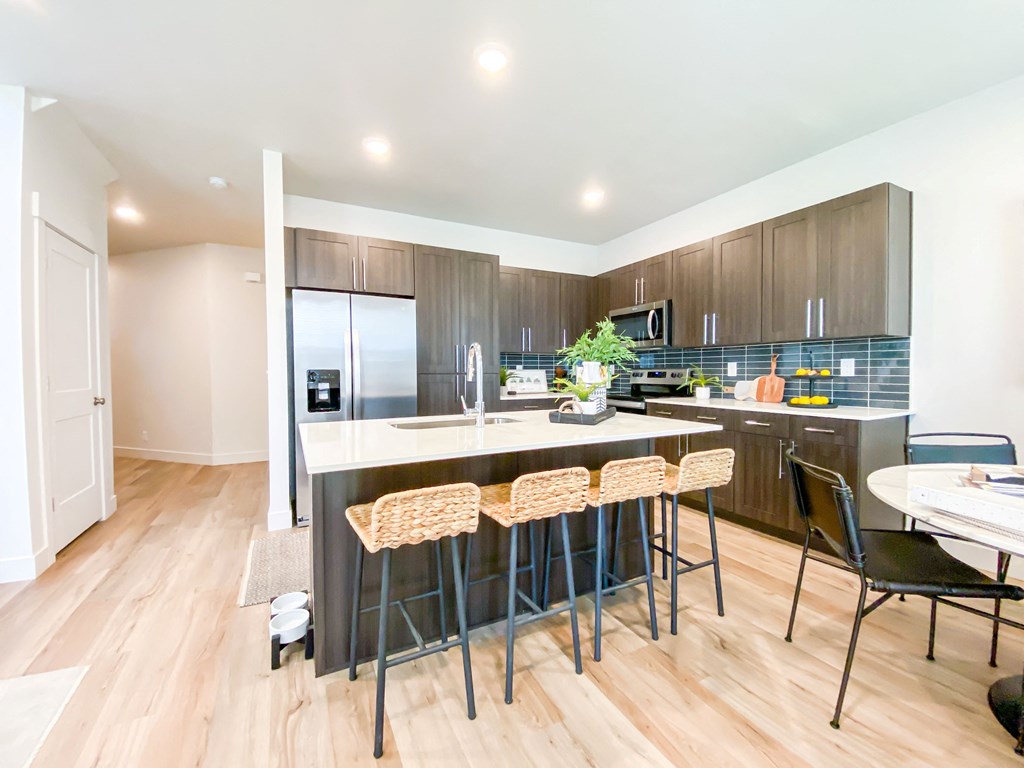 spacious kitchen with generous cabinet space and built in pantry
