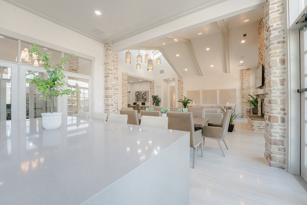 the kitchen and dining room of a house at Aldara Apartments in Saratoga Springs, Utah