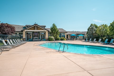 our resort style swimming pool is in front of our apartments at the preserve at green at Aldara Apartments in Saratoga Springs, Utah