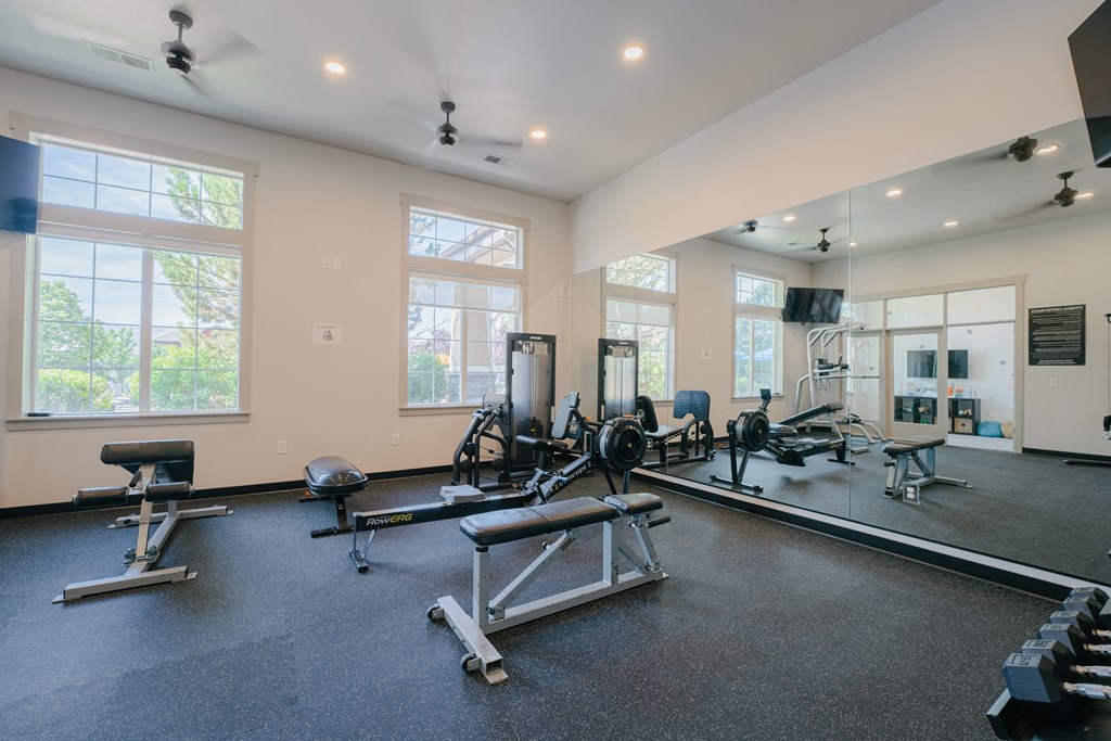 the gym with treadmills and weights at at Aldara Apartments in Saratoga Springs, Utah